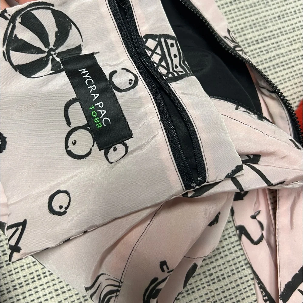 Mycra Pac Tour light pink geometric print crossbody tote bag sack purse